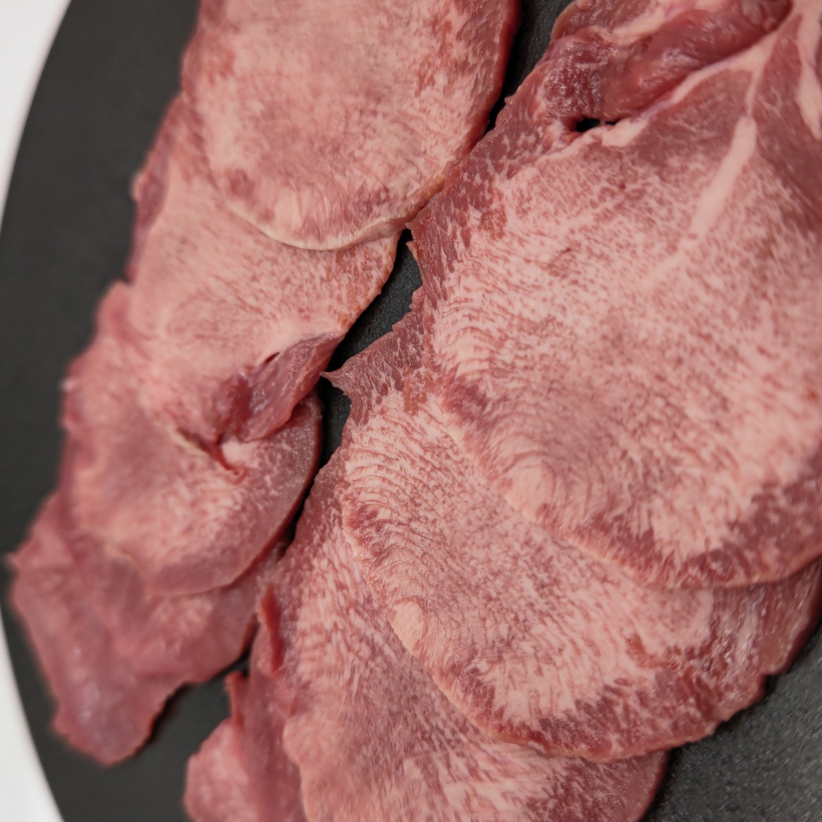NZ産放牧牧草牛<BR>タン2mmスライス150g<BR>✨焼き肉のマスト品!
