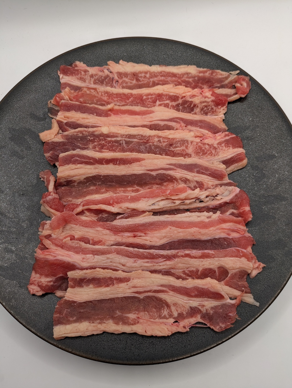 新パック式(今までのフィルムサンドではなくなりました)<BR>NZ産放牧牧草牛 <BR>バラ肉スライス250g<BR>牛丼などの煮込み用