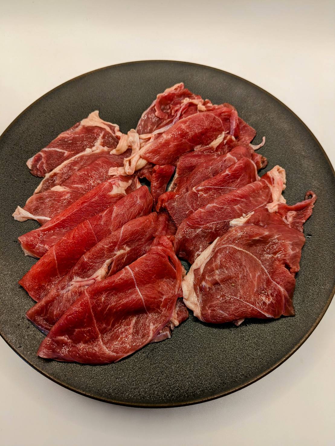 豪産放牧牧草仔羊　<BR>もも肉2mmスライス250g<BR>✨炒め物、鍋など日常的に！